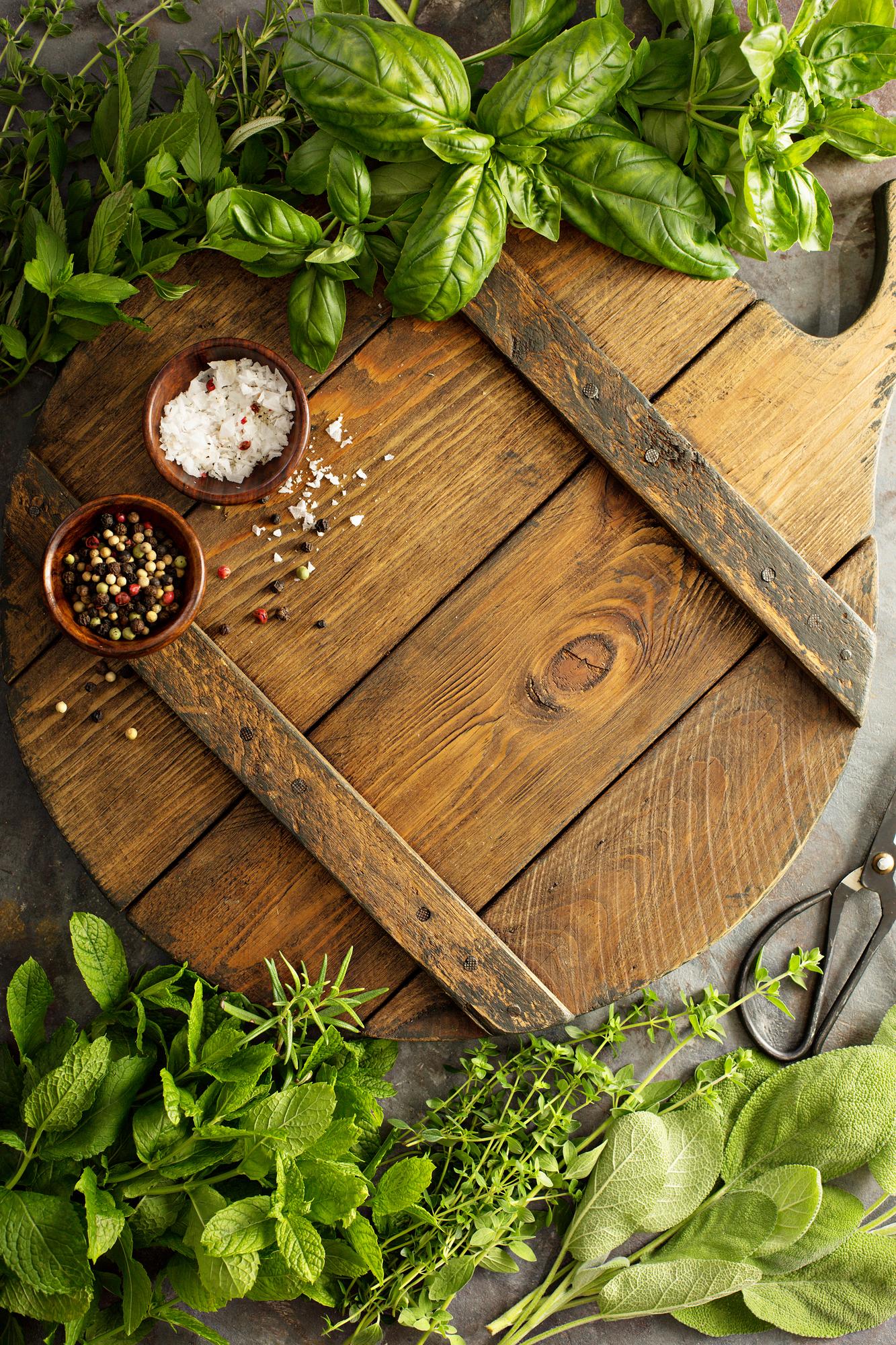 Close up of fresh herbs on cutting board